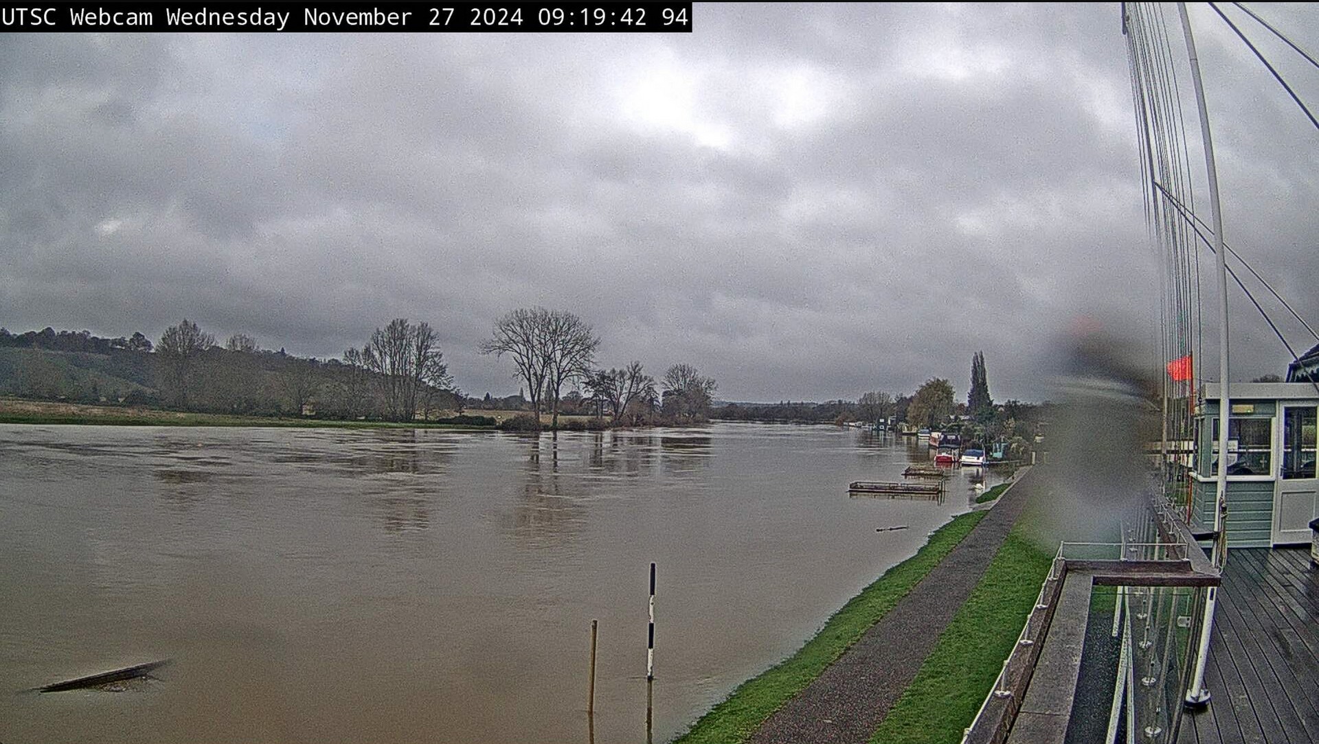 I&apos;m watching the river rise on Wednesday. The water is moving up the grassy bank, and the black foot marker of the Pole has nearly disappeared.