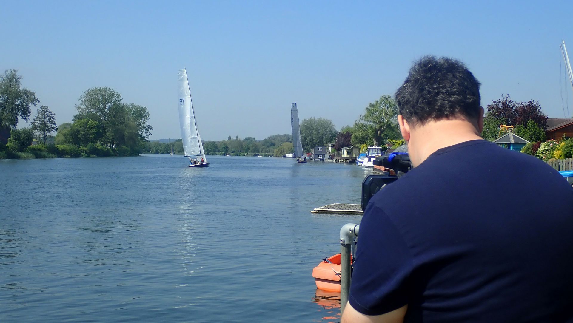 Filming sailing dinghies from the shore