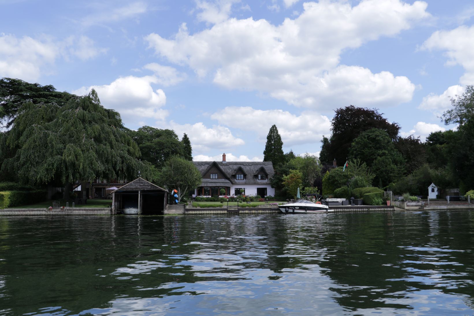 A house with a beautiful frontage to the River Thames